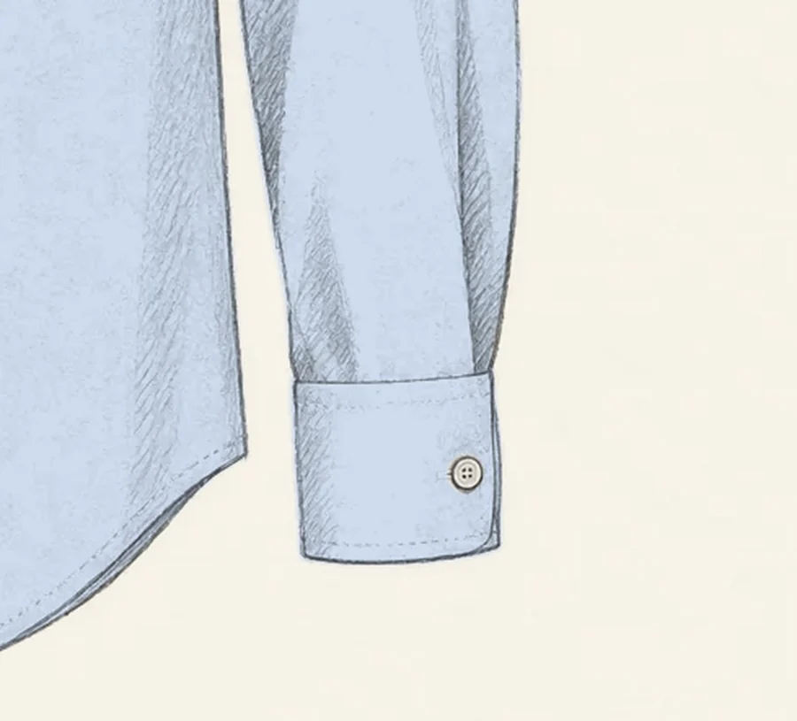 A barrel cuff drawn in pencil on a pale blue shirt sleeve, a single band closed with one pearl button